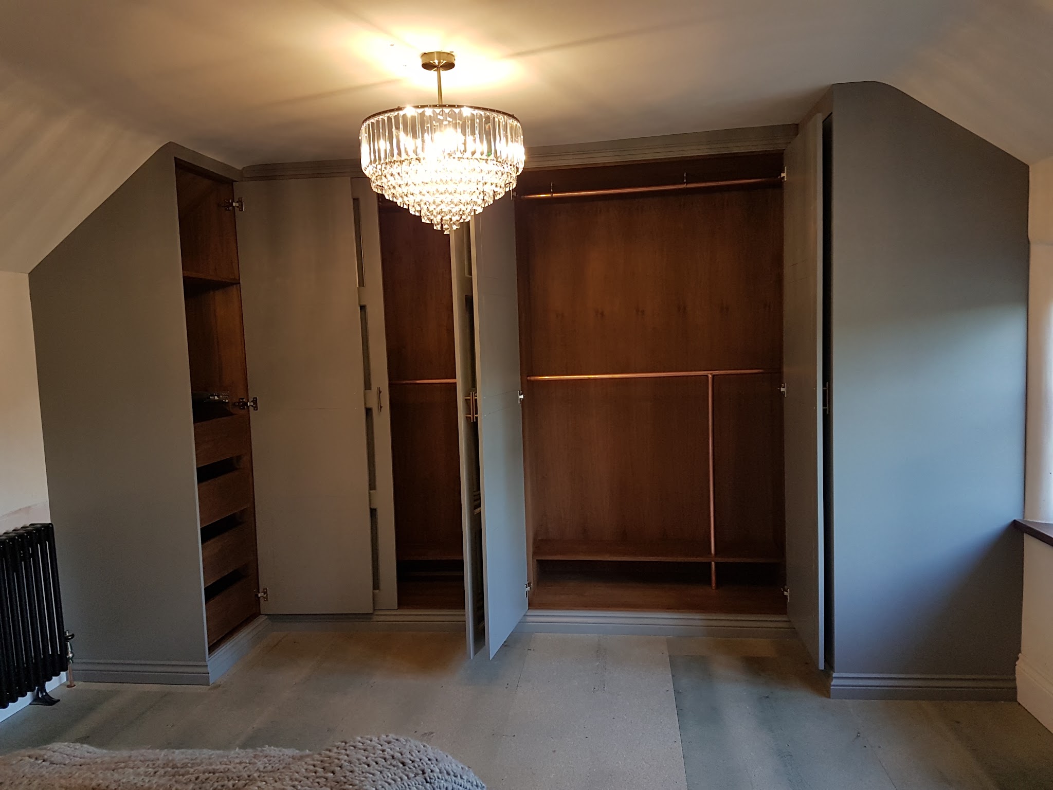 Built-in bedroom storage with the doors open