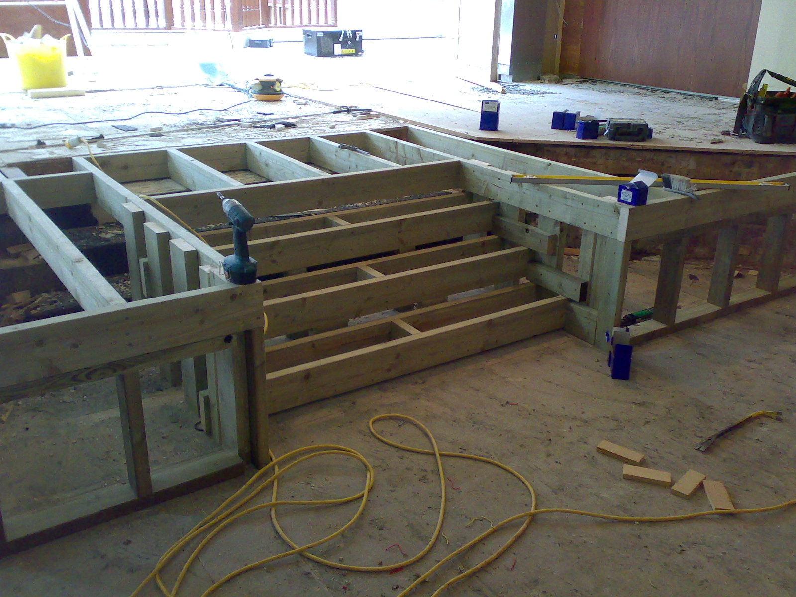 Raised decking frame with steps under construction
